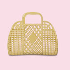 Woven handbag with lattice design on a white background